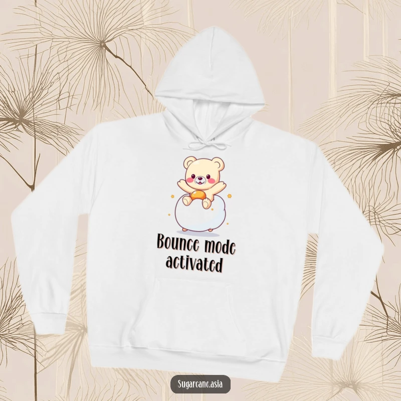 Funny Kawaii gummy bear character having a blast bouncing on a giant marshmallow, designed for cozy, humorous wear.